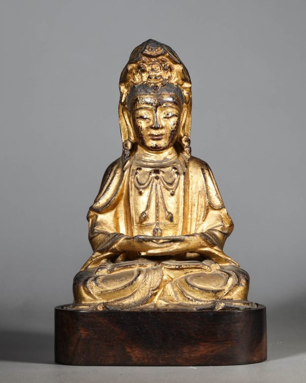 4067:A Tibetan Buddhist copper lacquered gold Avalokiteshvara statue.