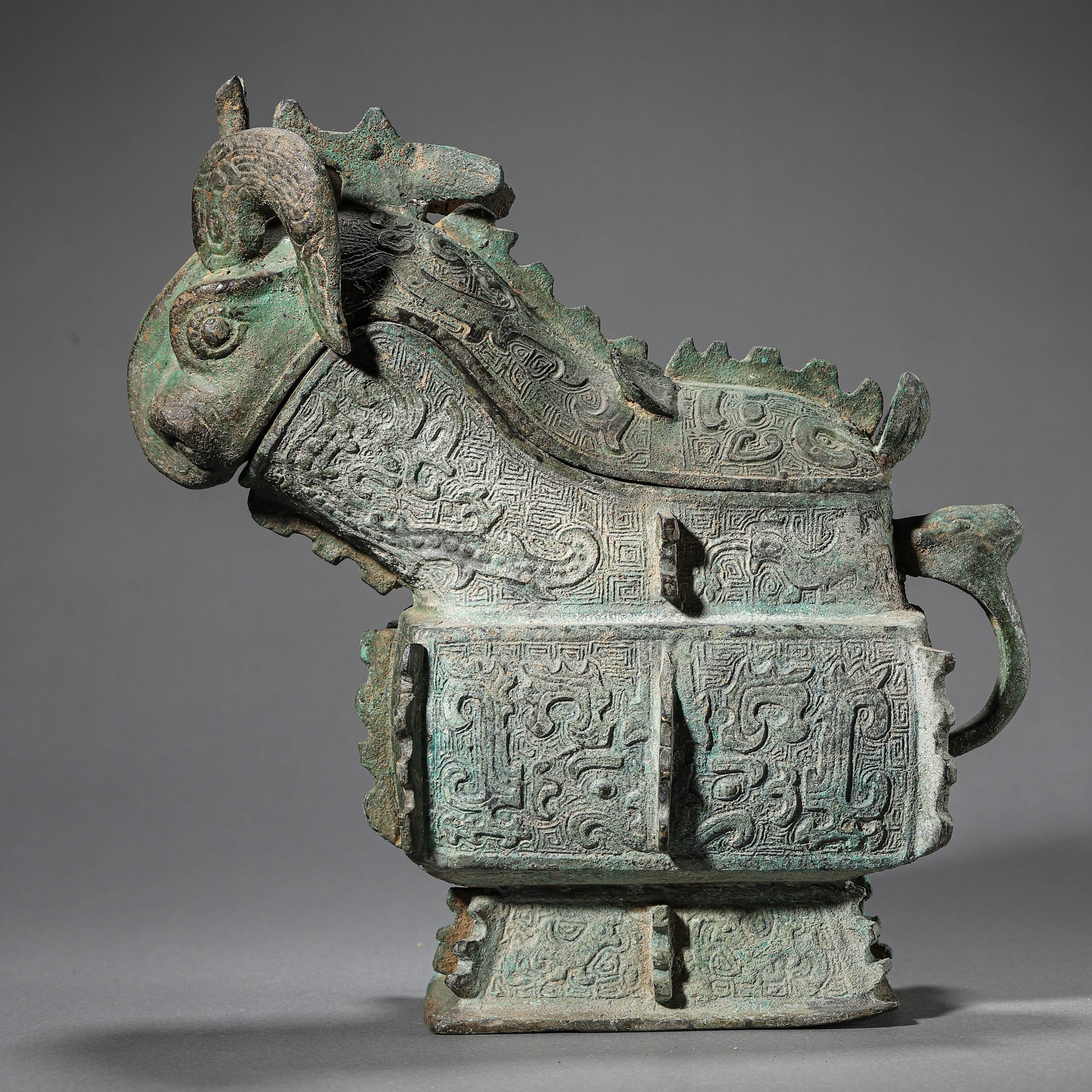 A CHINESE EARLIER SONG DYNASTY BRONZE RITUAL WINE VESSEL, POSSIBLY 10TH CENTURY OR EARLIER.