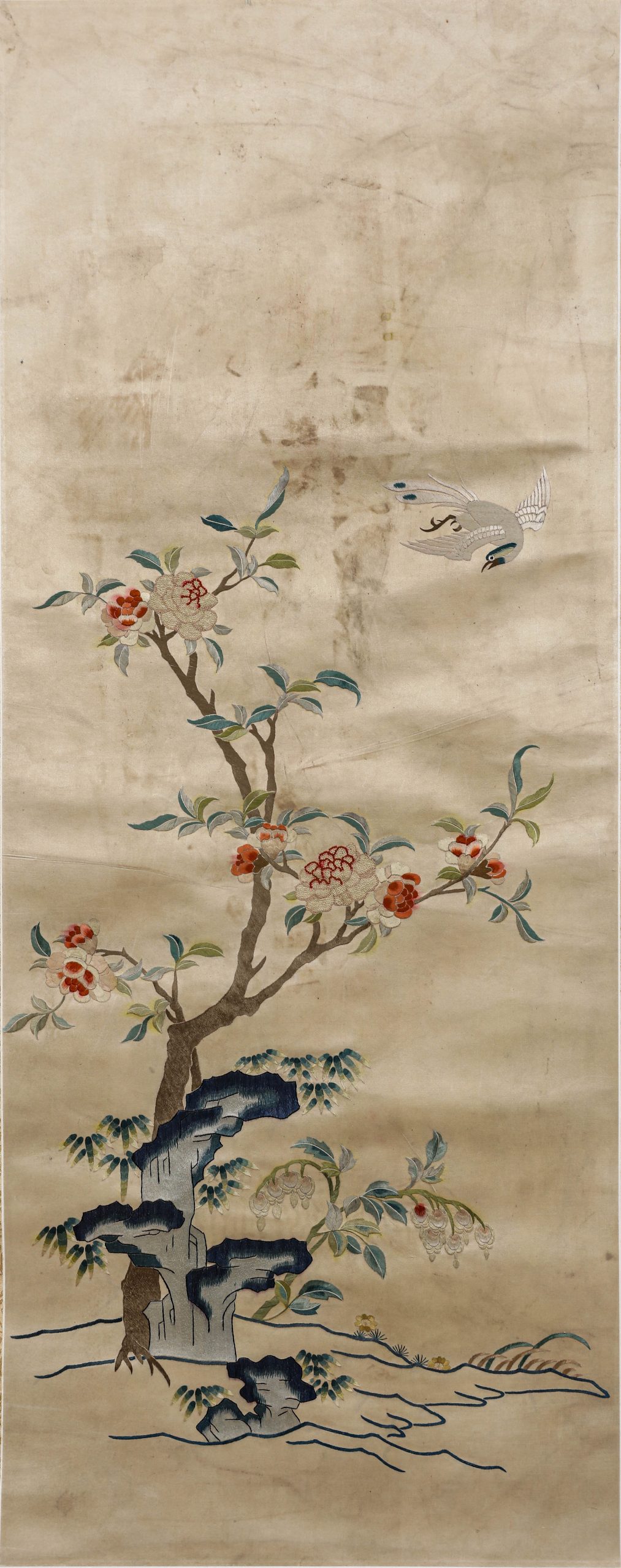 A CHINESE EMBROIDERED BIRD AND FLOWER PANEL, POSSIBLY QING DYNASTY, 18TH–19TH CENTURY.