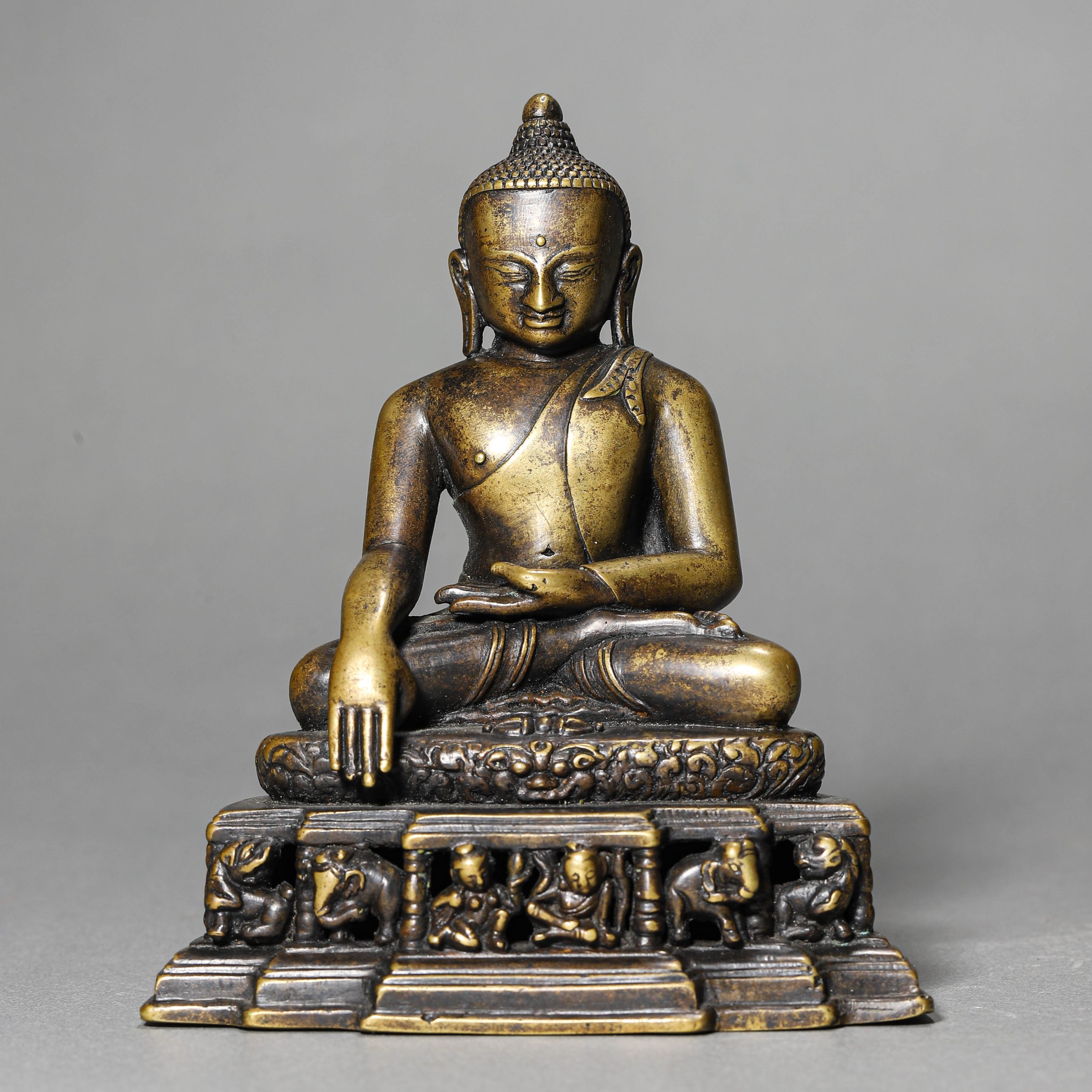 A CHINESE BRONZE SHAKYAMUNI FIGURE, POSSIBLY QING DYNASTY, 18TH–19TH CENTURY.