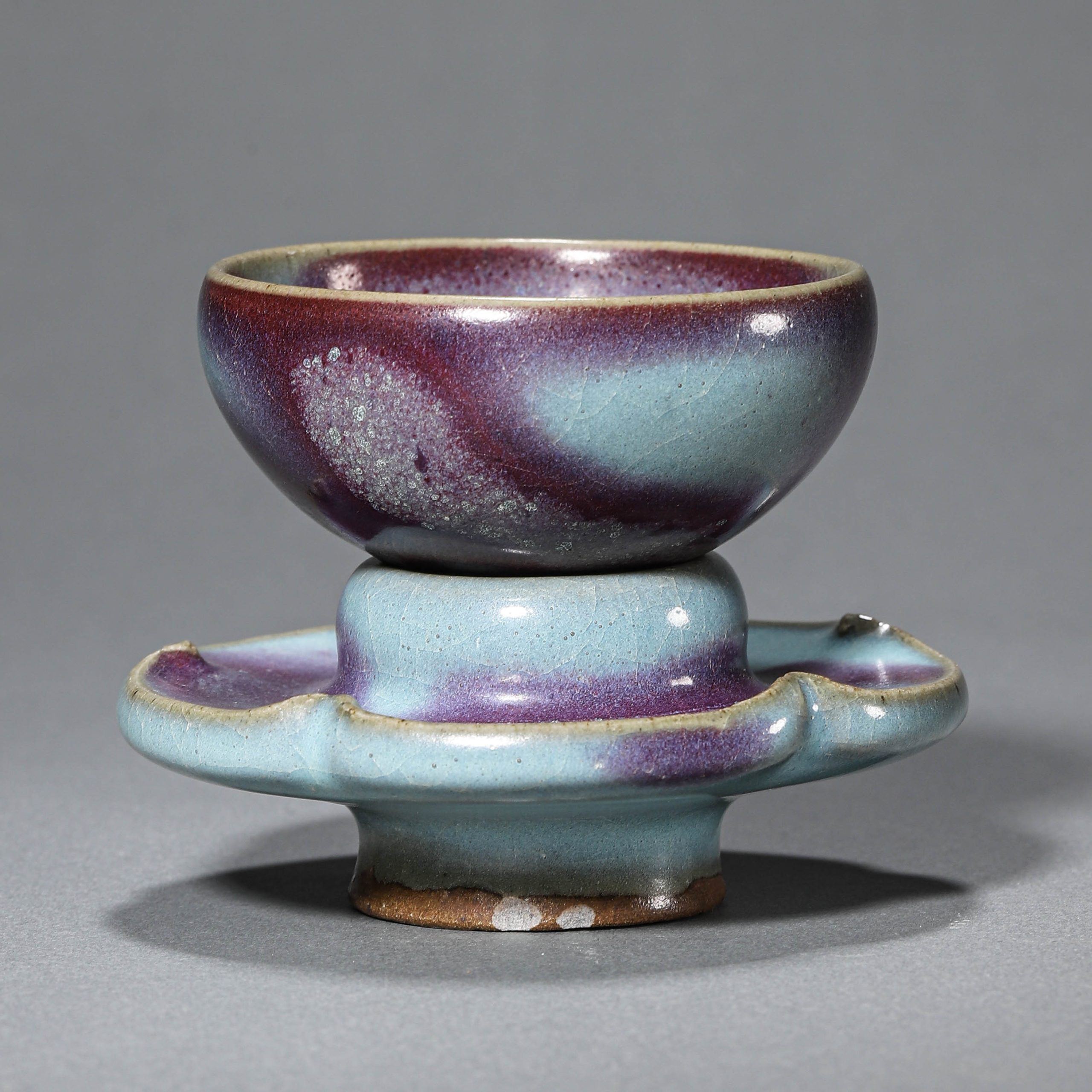 A CHINESE SONG DYNASTY JUNWARE CUP WITH STAND, POSSIBLY 10TH–13TH CENTURY.